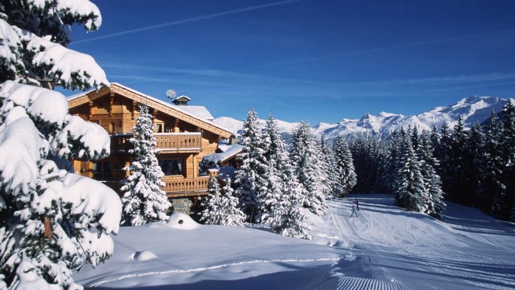 Chalet Bellecote, a six-bedroom sanctuary with direct ski-in/ski-out access, offers stunning mountain views and top-tier wellness amenities